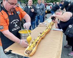 Restaurant owner Sees birthday Together Using 510-foot-long cheesesteak