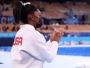 Simone Biles believes that her fans are helping her to see beyond her gold medals.