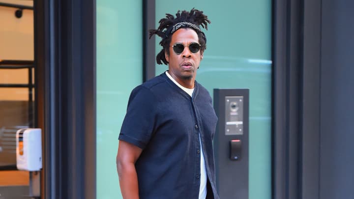 Fanatics, a sports merchandise company, is now valued at $18 million with new investors that include Jay Z, a hip-hop mogul.