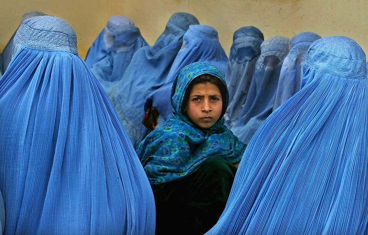 Taliban warn Afghan women to avoid work, saying that soldiers are not trained to respect them.