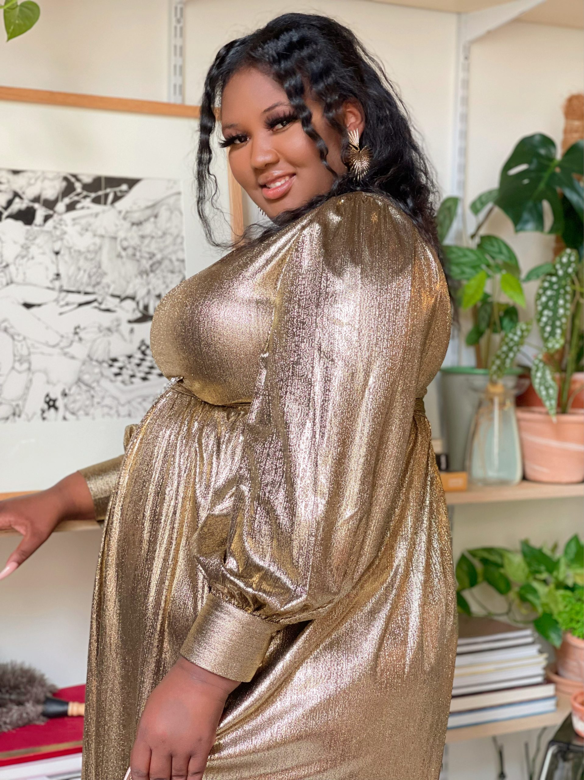 Raytysha Lashay picture in a golden dress