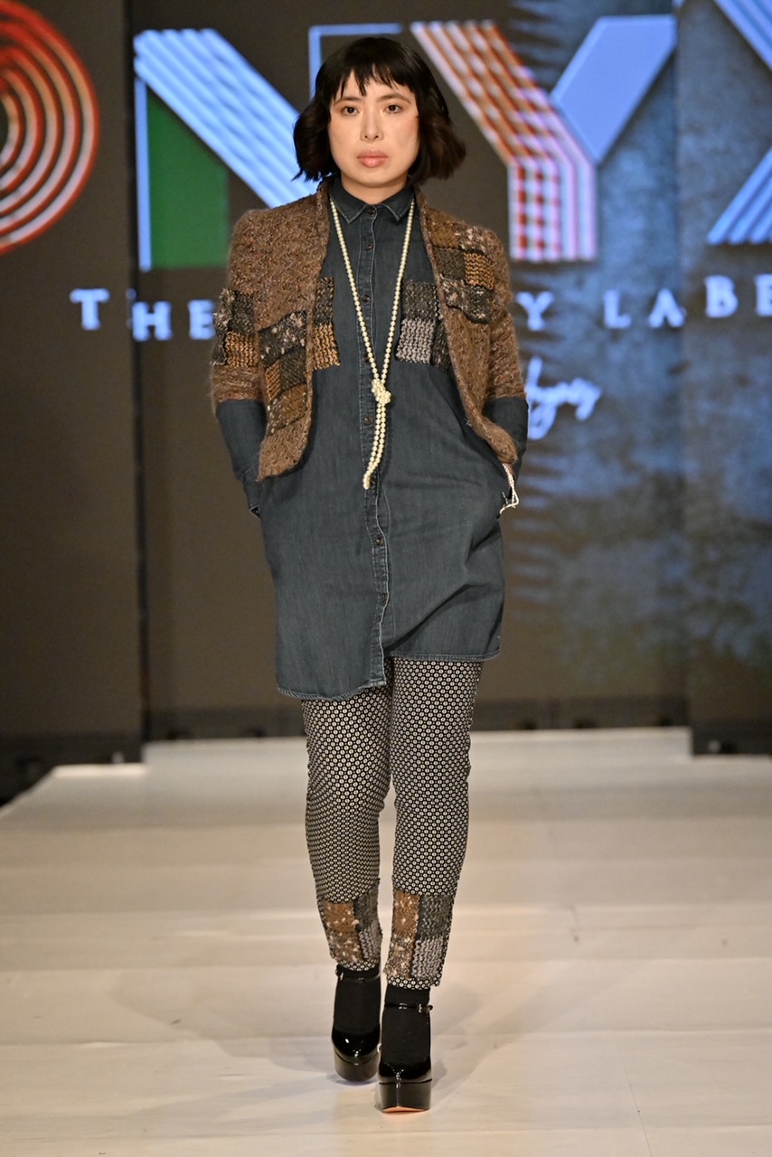 NEW YORK, NEW YORK - FEBRUARY 11: A model walks the runway wearing ONYX by Justin Haynes during the NYFW hiTechMODA Season 7 Réversion #noapology show at The Edison Ballroom on February 11, 2022, in New York City.  (Photo by Slaven Vlasic/Getty Images for NYFW hiTechMODA)