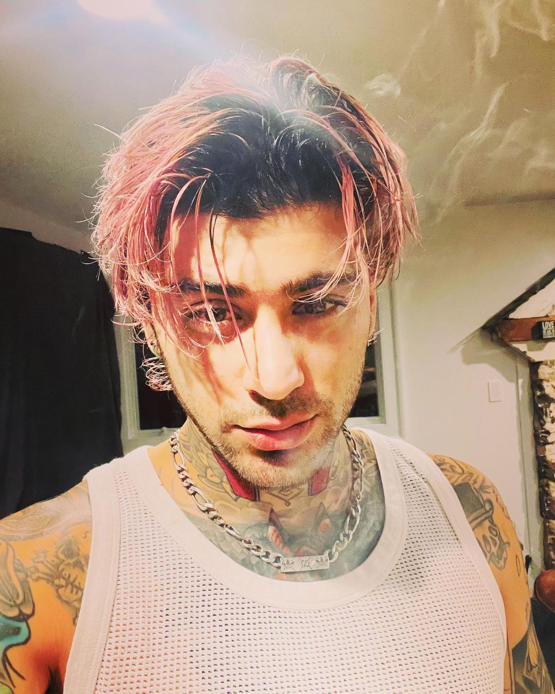 Zayn Malik Shows Off New Pink Hair and Extensive Tattoos in Smoldering Selvage