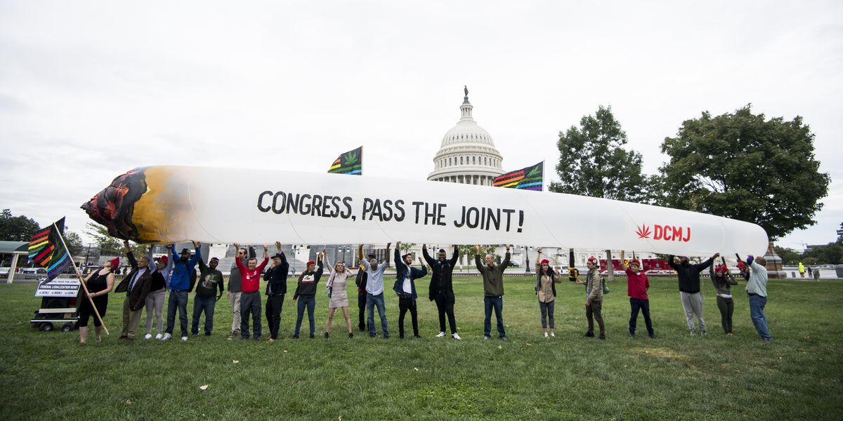Trying to legalize Marijuana slogan Congress Pass The Joint