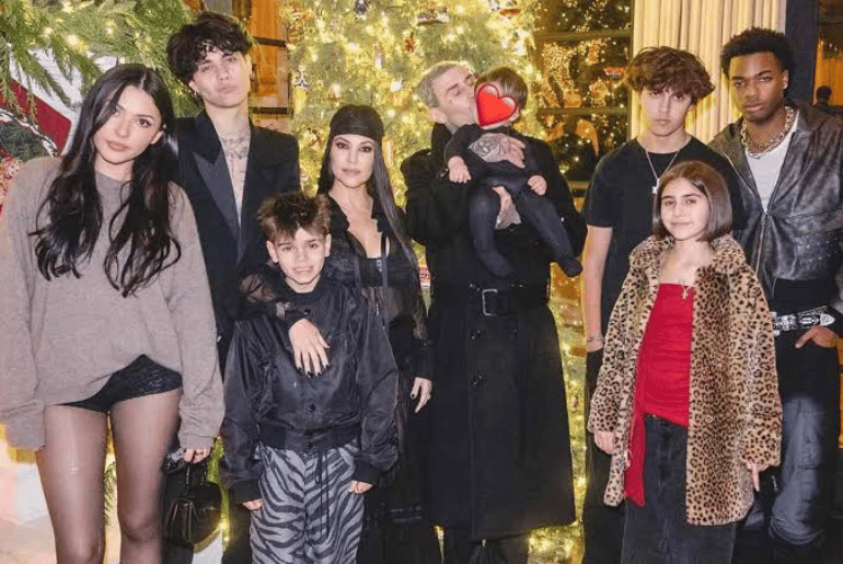 Kourtney Kardashian Dazzles at Holiday Party with Husband Travis Barker and Their Blended Family