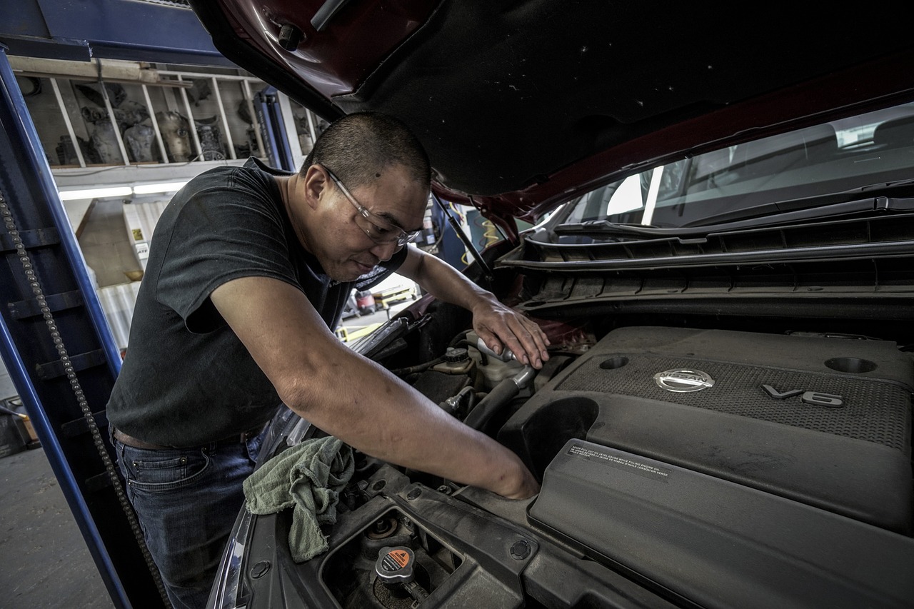 Man fixing a car